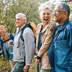 Patient in Minot talking to friends to adjust to dentures