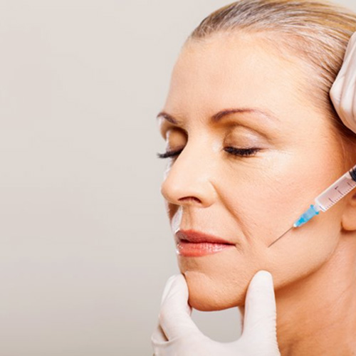 Lady receives BOTOX injection