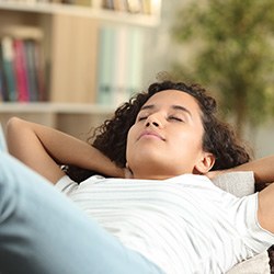 Woman resting on a couch